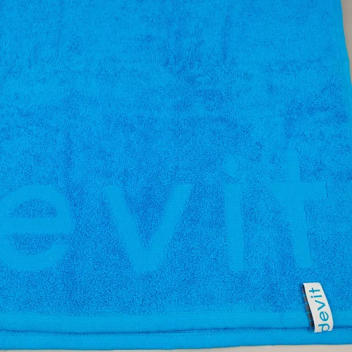 Нанесення логотипа DEVIT на махровий рушник виконано рельєфним способом.